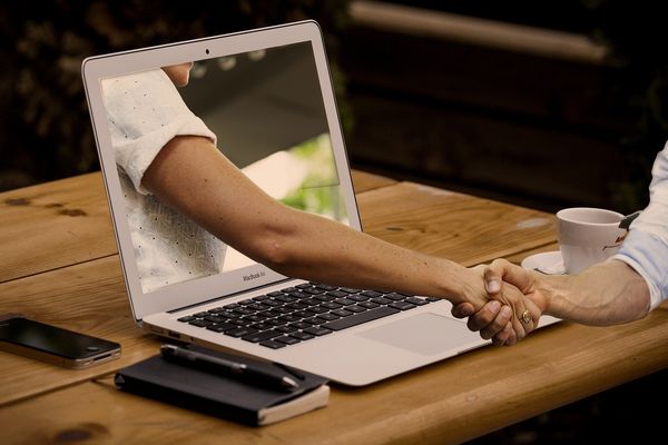 Person Searching for Remote Jobs Online 2